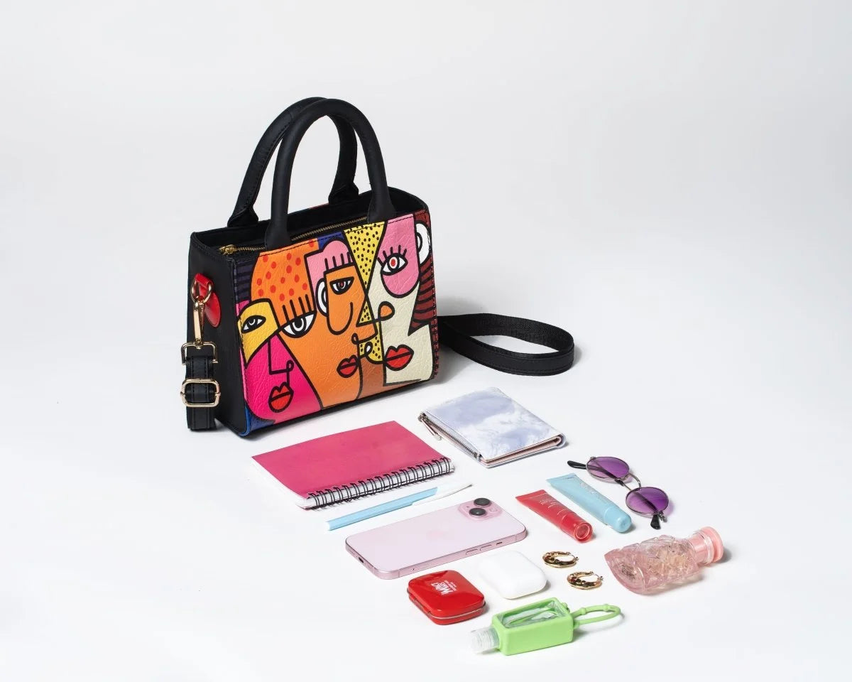 Colorful Vegan tote bag Mini FETTI Faces tote with accessories on a white background