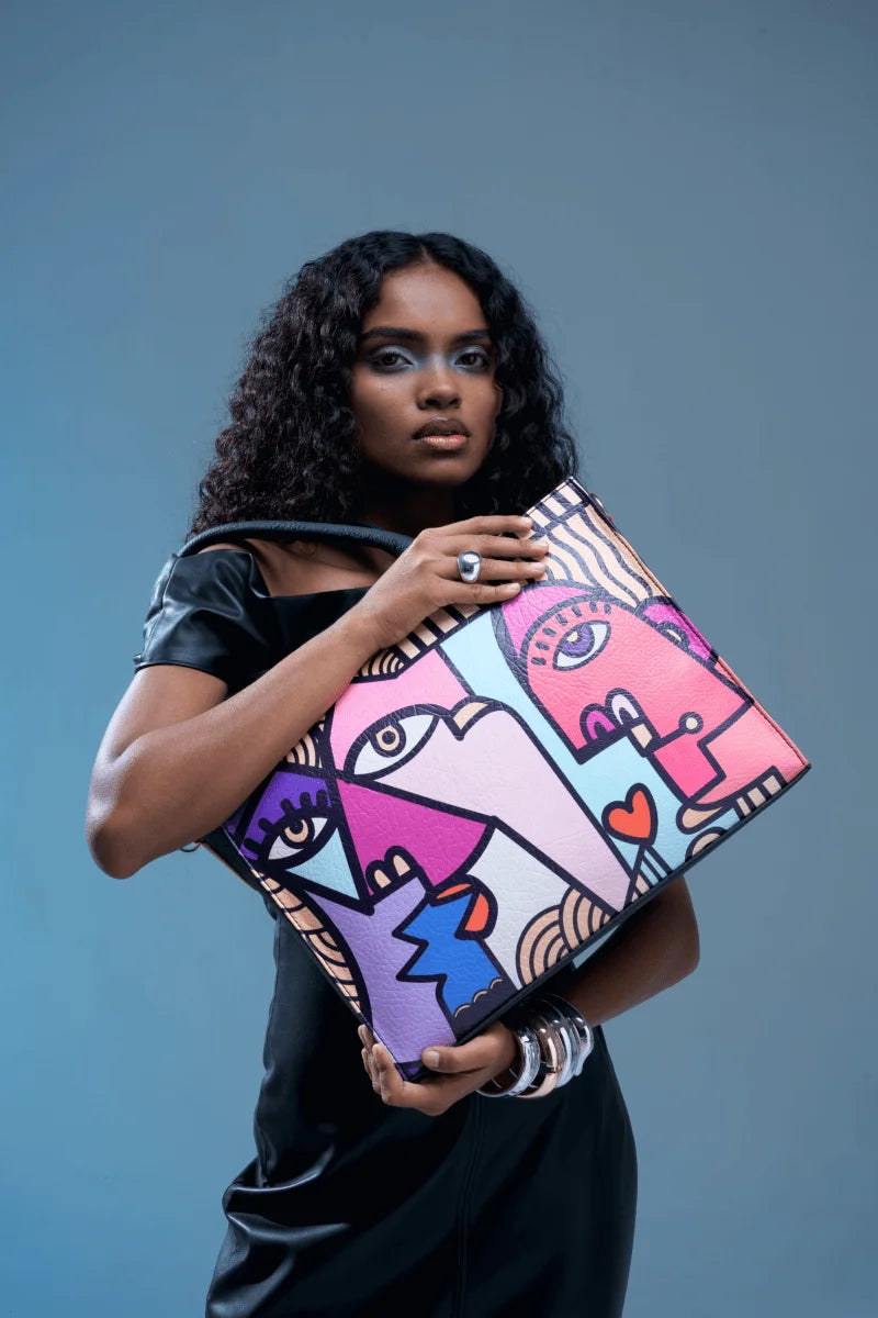 Side profile of pink tote bag showing structure