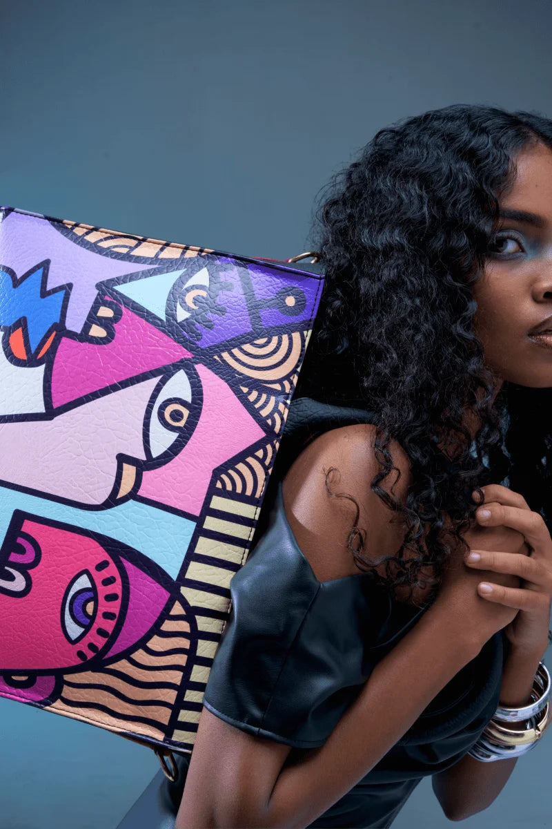 Water-resistant material detail of everyday tote bag held by a woman